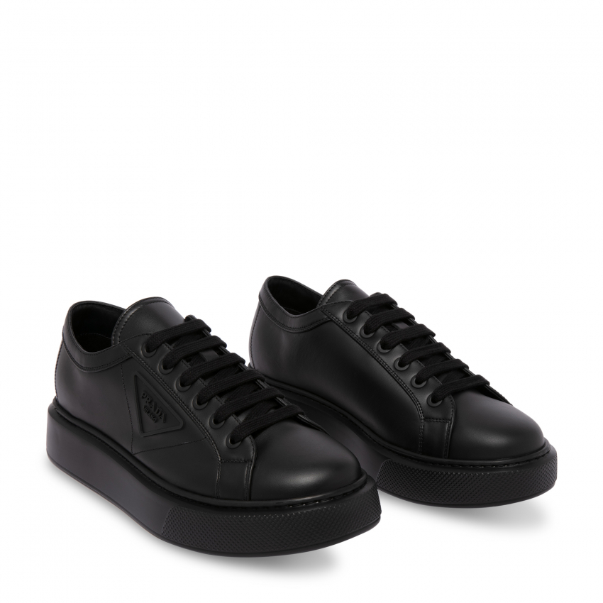 Prada Macro leather sneakers for Men - Black in Oman | Level Shoes